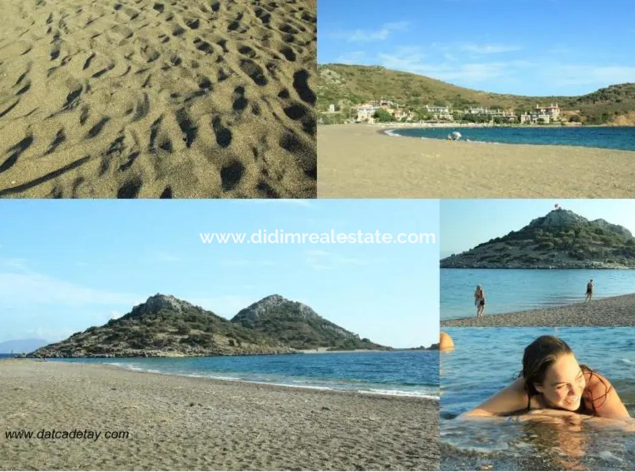 Datça İlçesi Kızlan Mevkisinde Denize Sıfır 10000M2 Turizm İmarlı Denize Sıfır Otel Yapımına Uygun Satılık Arsa